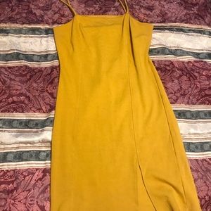 Mustard fitted dress with slit